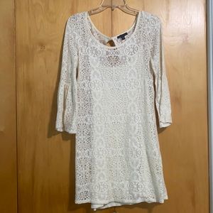 An American Eagle Outfitters white lace dress, size medium.